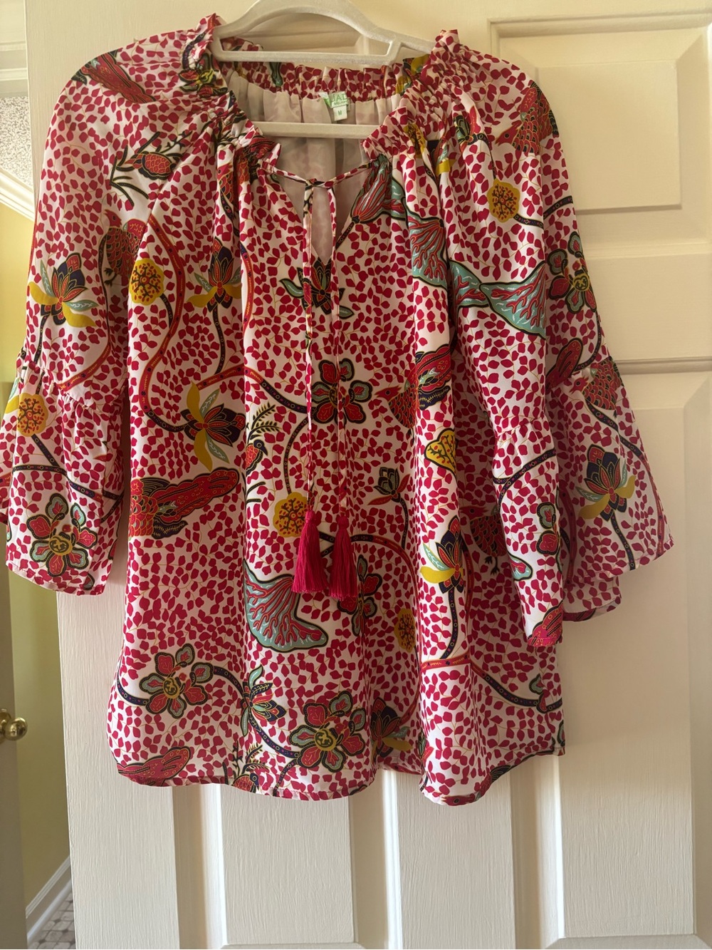 Vibrant colors in fun, flowy top